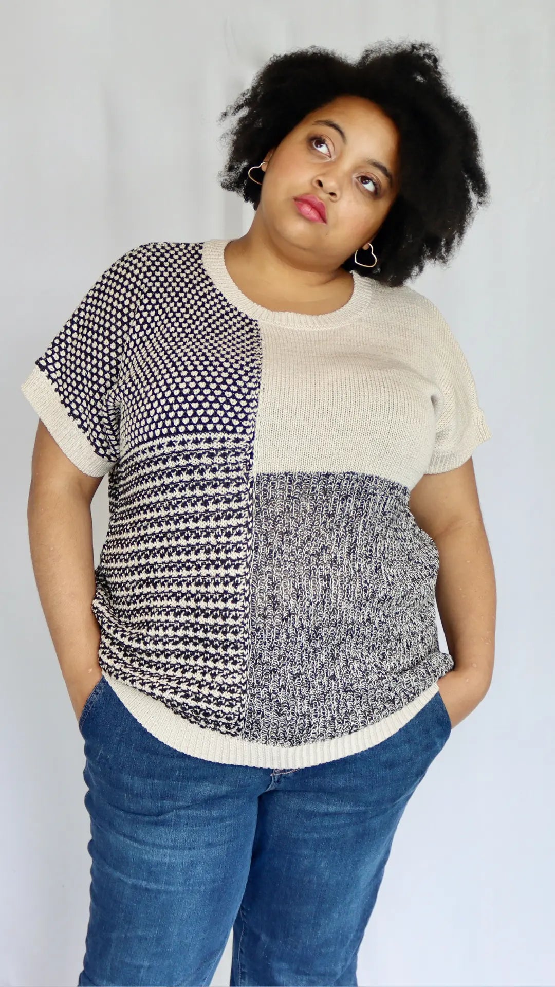 Plus size short sleeve sweater paired with jeans for easy outfit