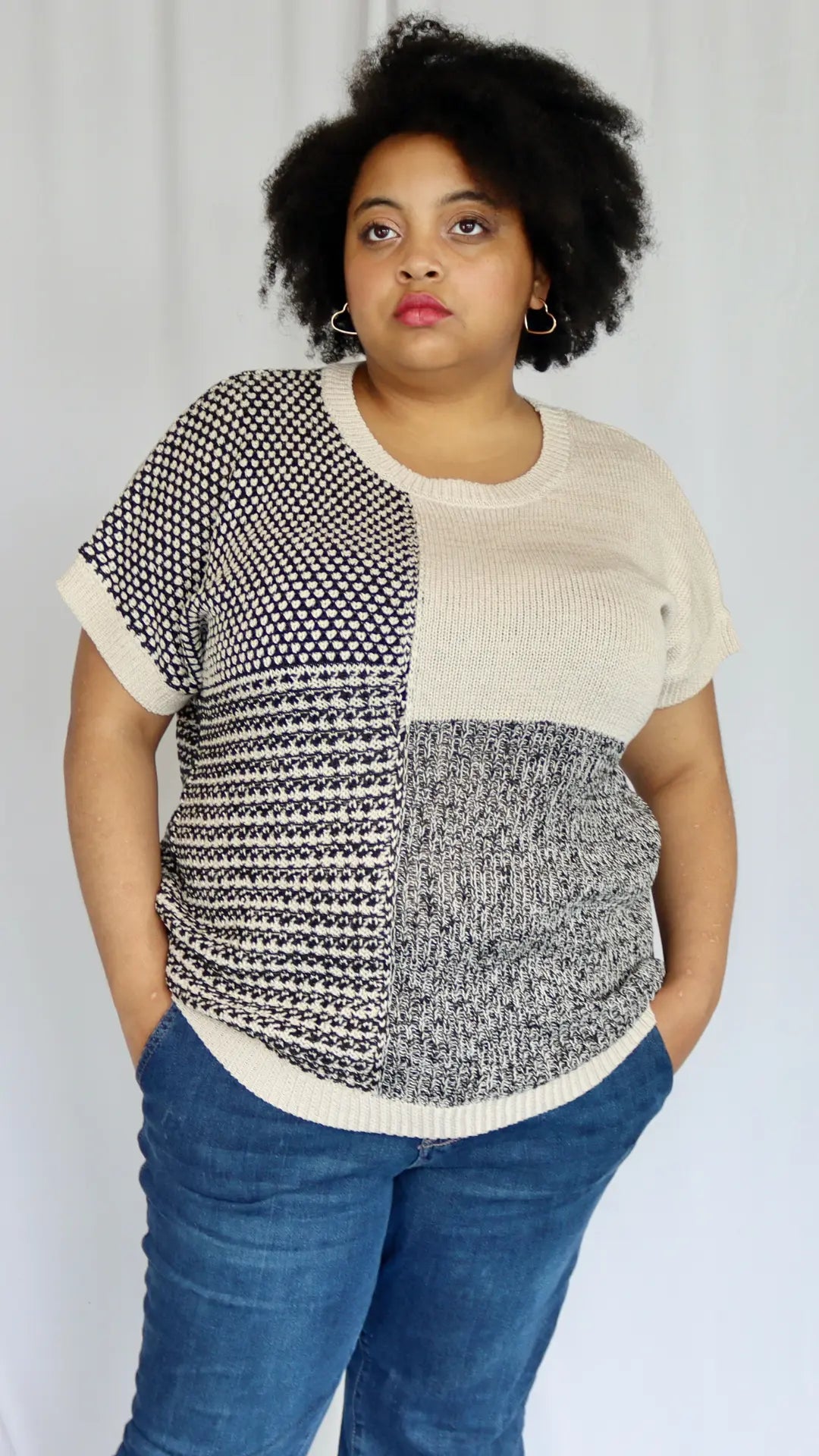 Plus size black and beige colorblock knit sweater with relaxed fit
