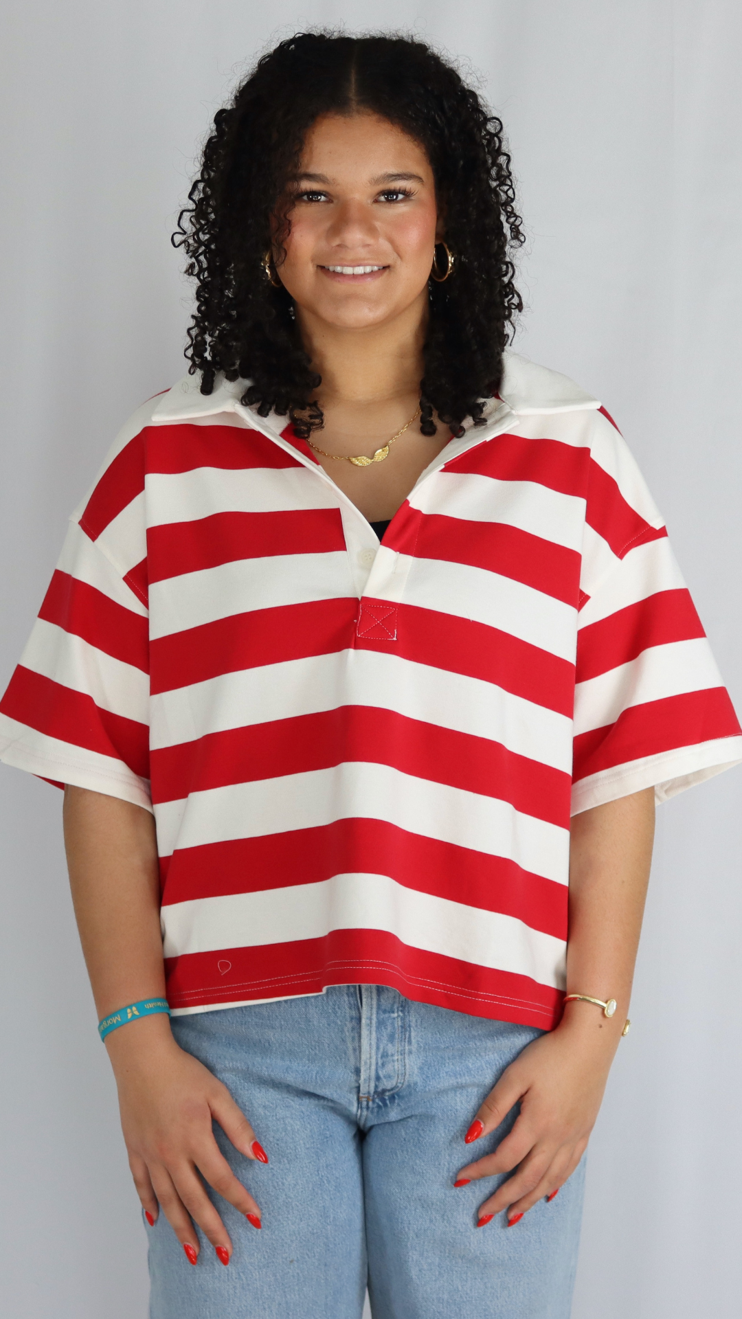 STRIPED OVERSIZED POLO