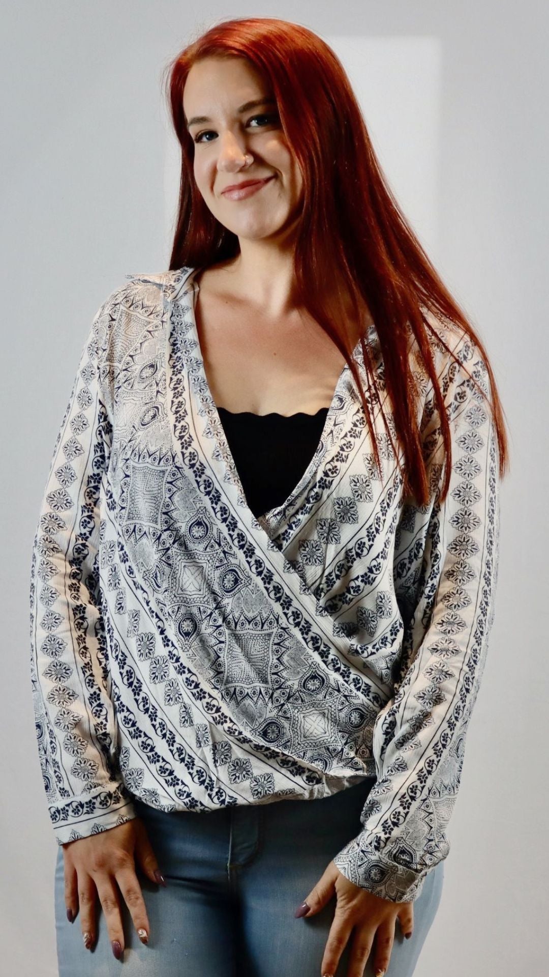 White crossover blouse with black bandanna print