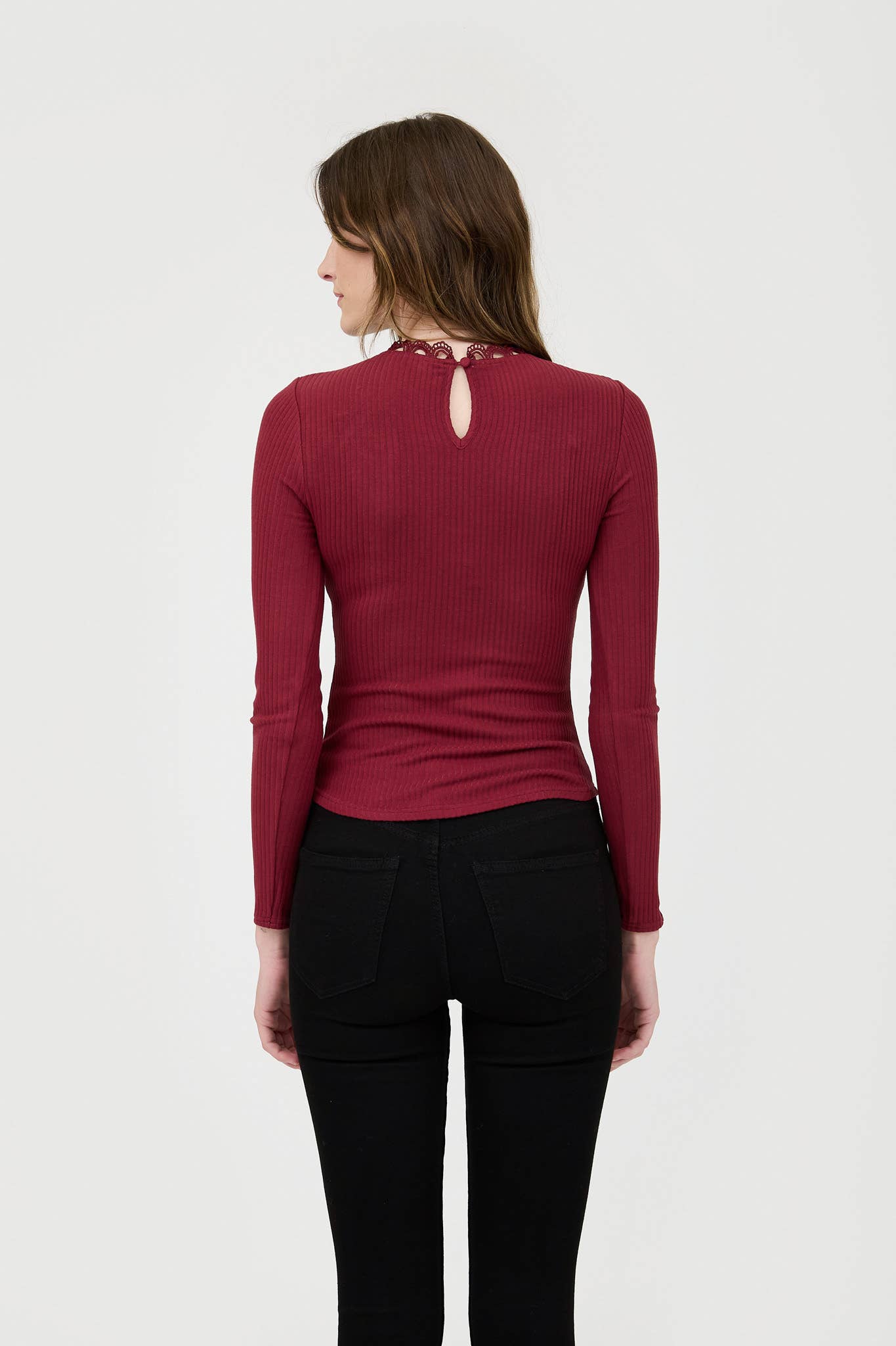 Women's long sleeve knit top with lace neckline detail