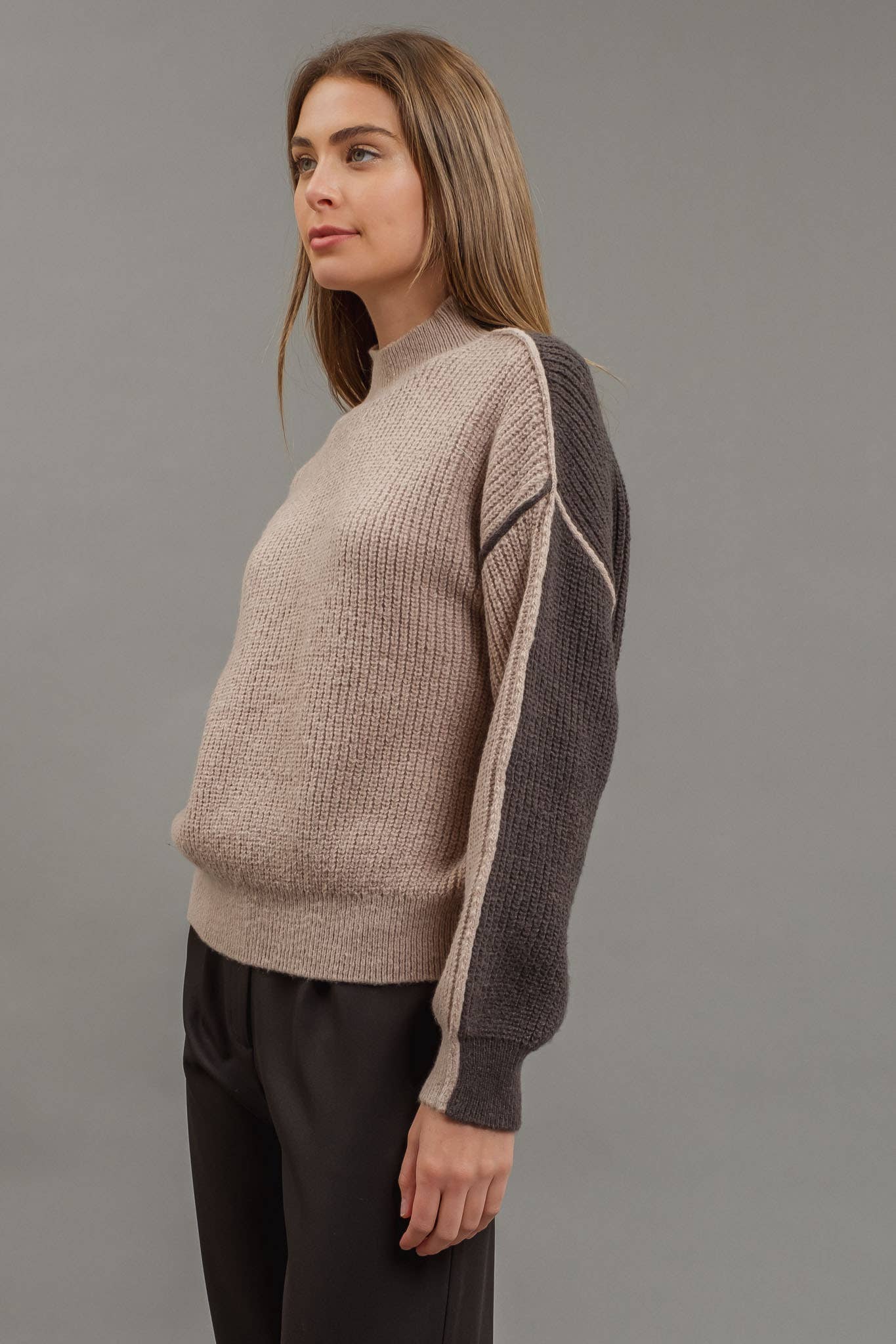 olorblock mock neck exposed seam sweater, cozy knit design