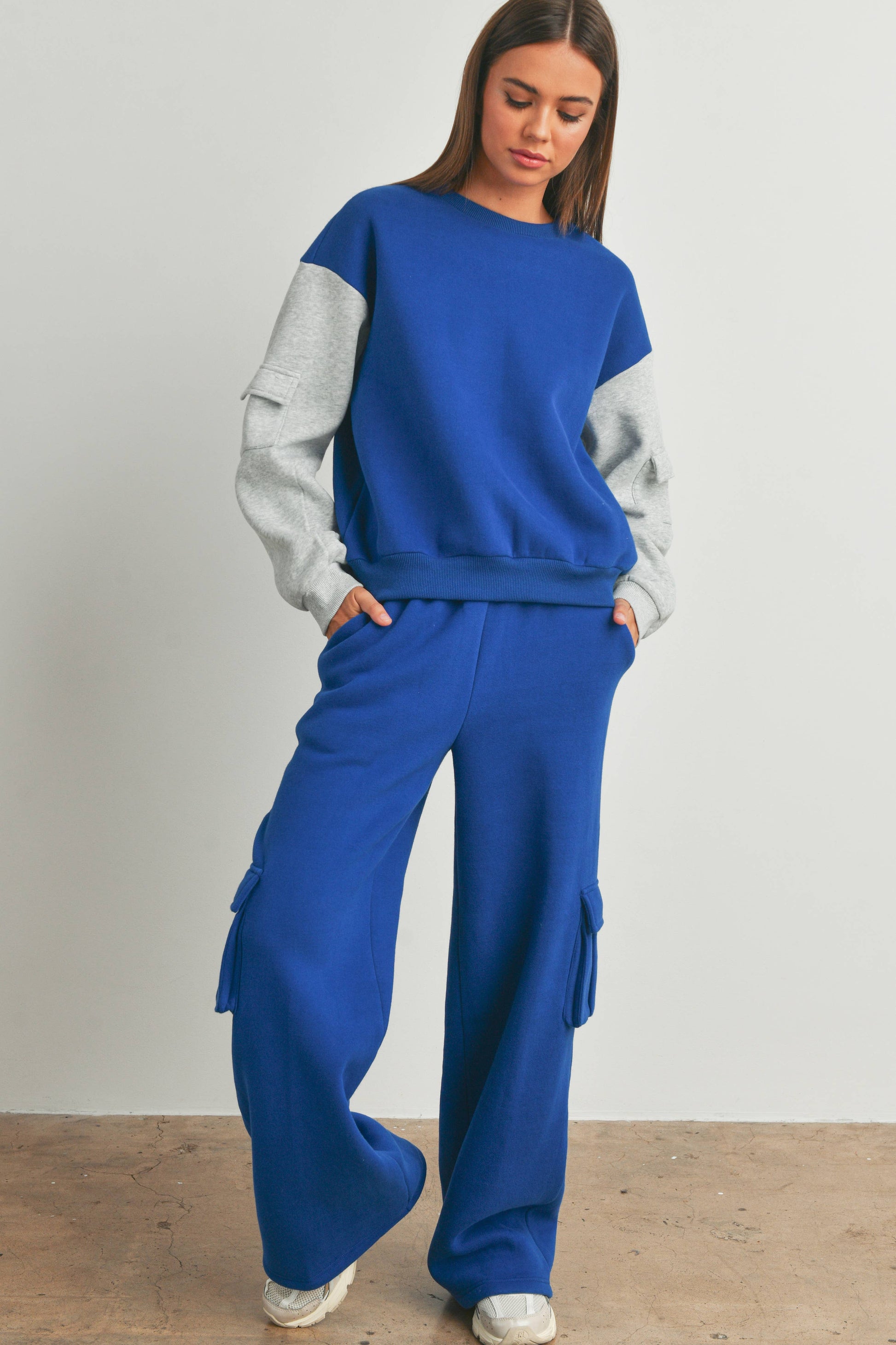 Patched pocket contrast sweatshirt with bold sleeve details