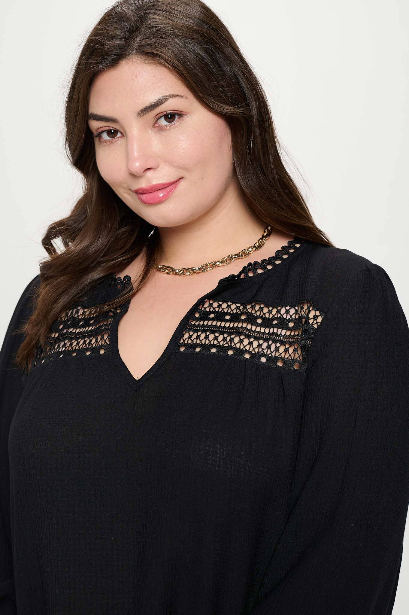 Plus size split neck eyelet trim long sleeve knit top for women