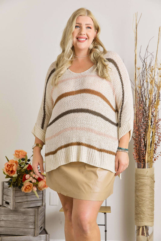 Plus size striped sweater with a relaxed fit and bold stripes