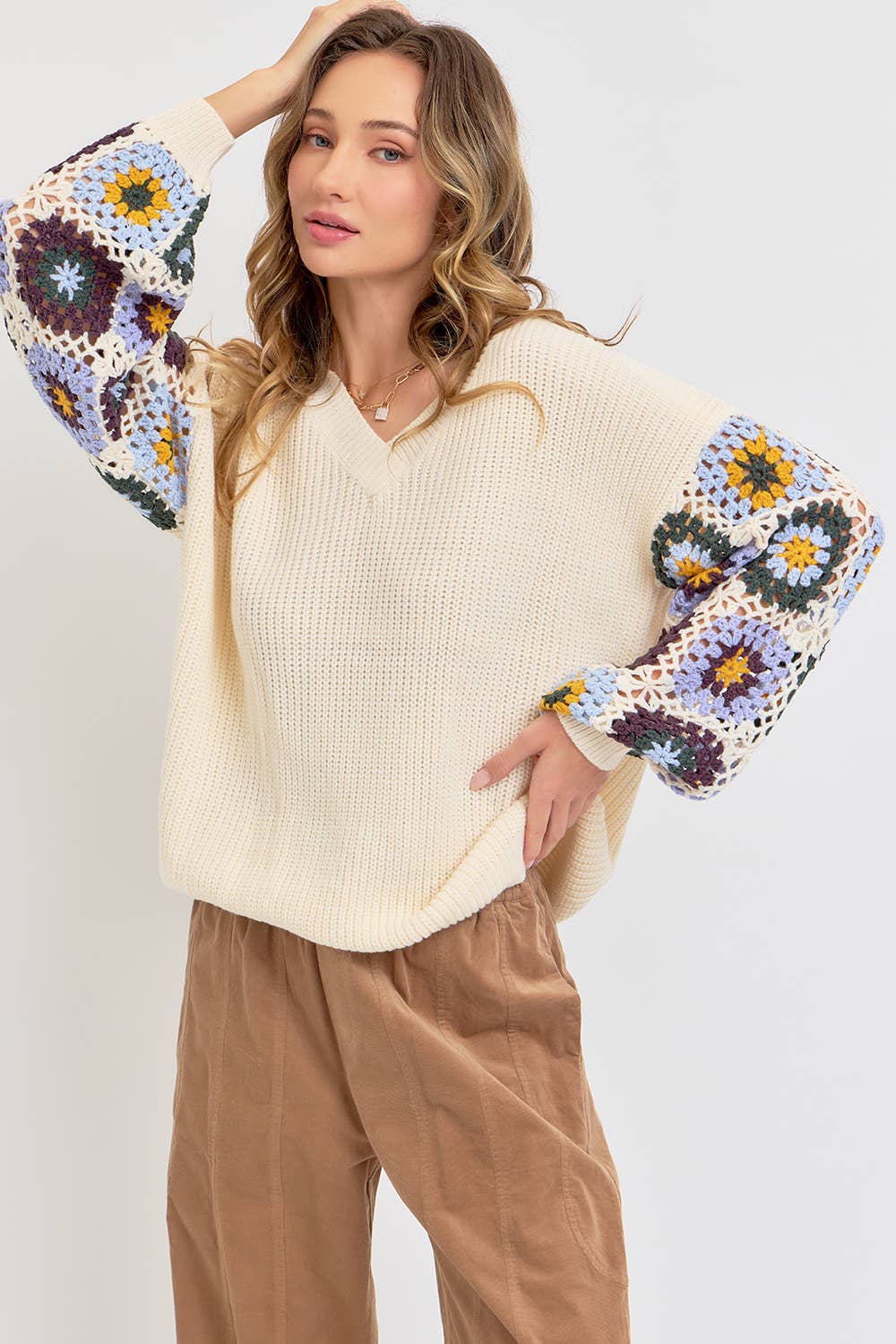 Boho Crochet Patchwork Sweater with textured knit and crochet sleeves