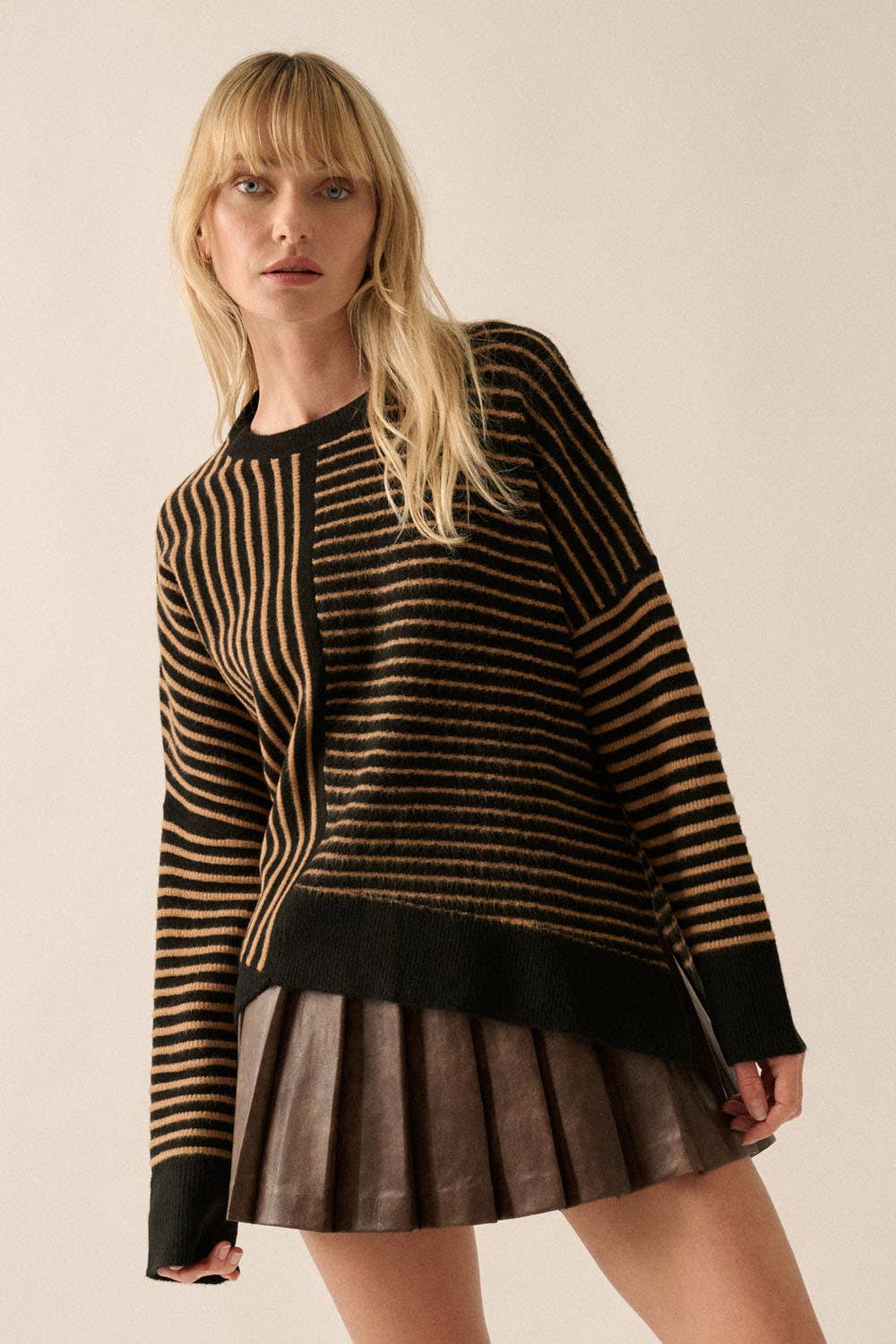 Striped round neck sweater with asymmetrical hem for women