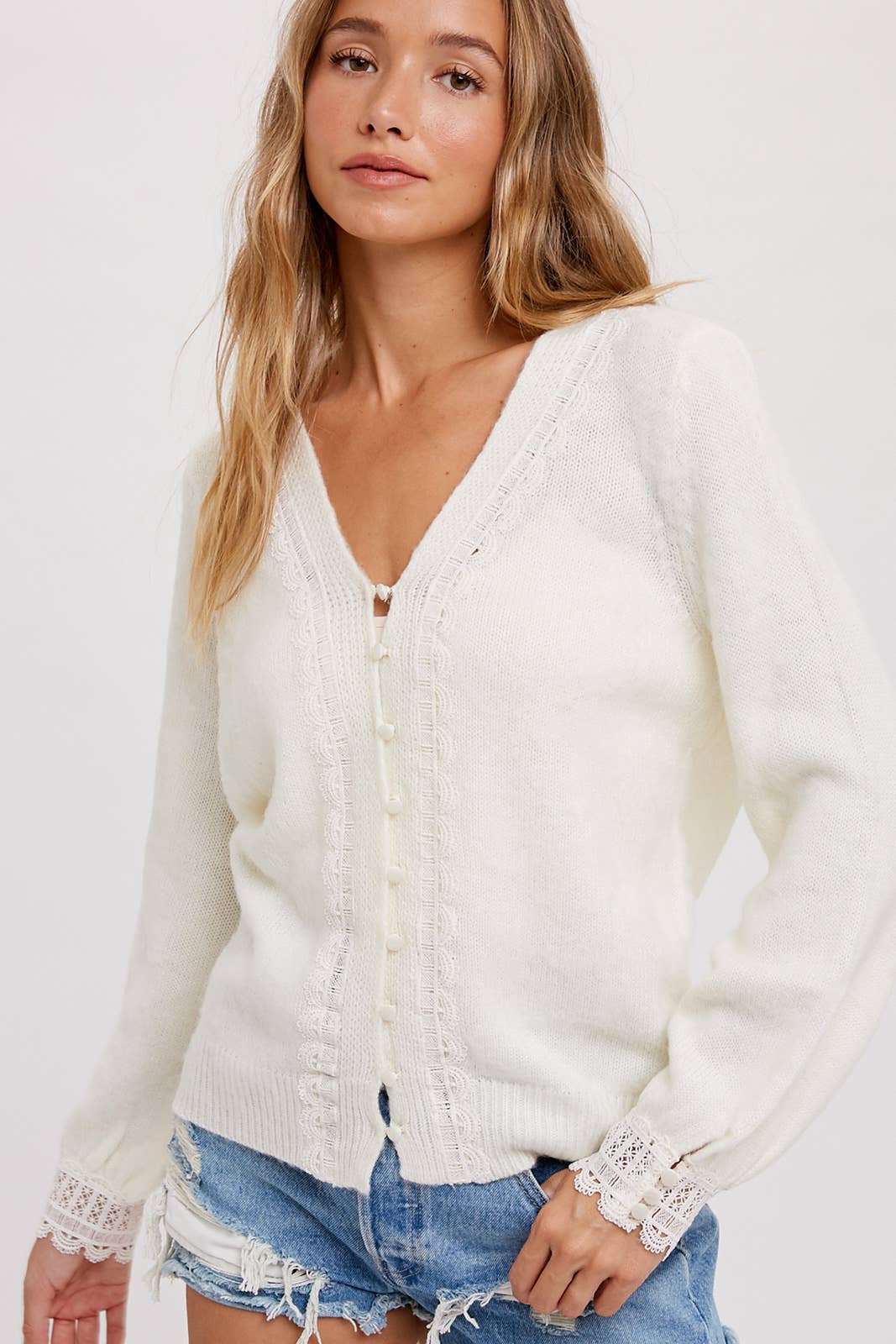 Women's lace trim button-up pullover with feminine neckline