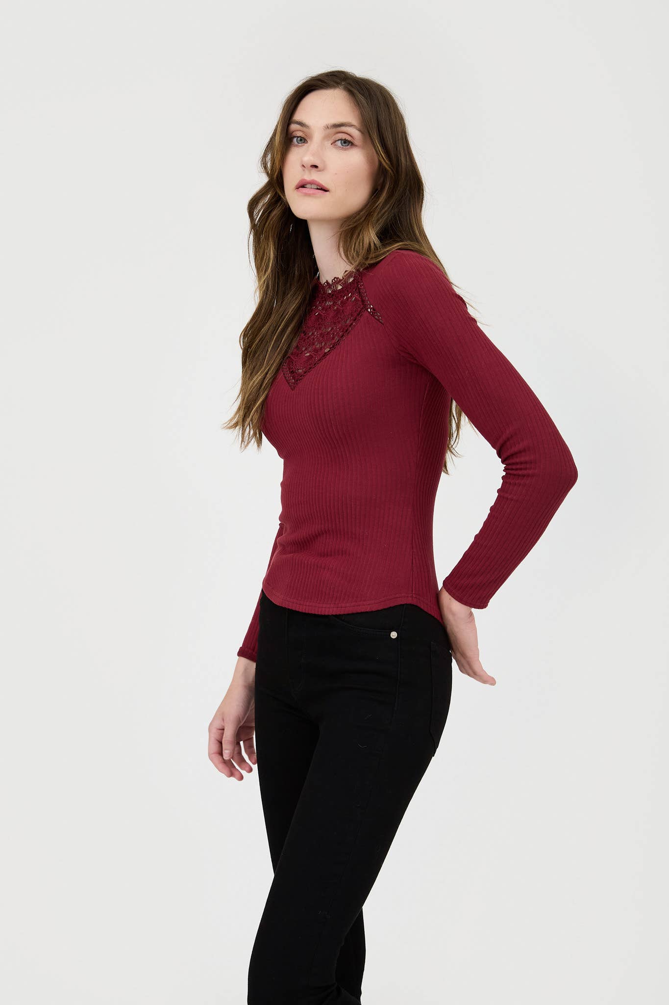 Women's long sleeve knit top with lace neckline detail