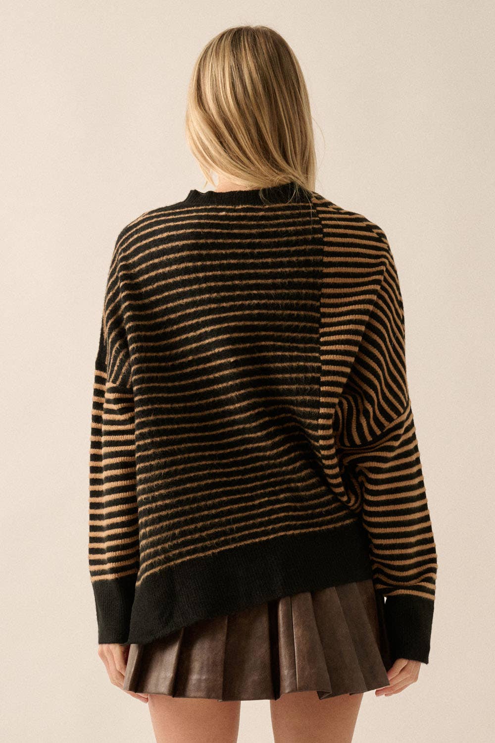 Striped round neck sweater with asymmetrical hem for women