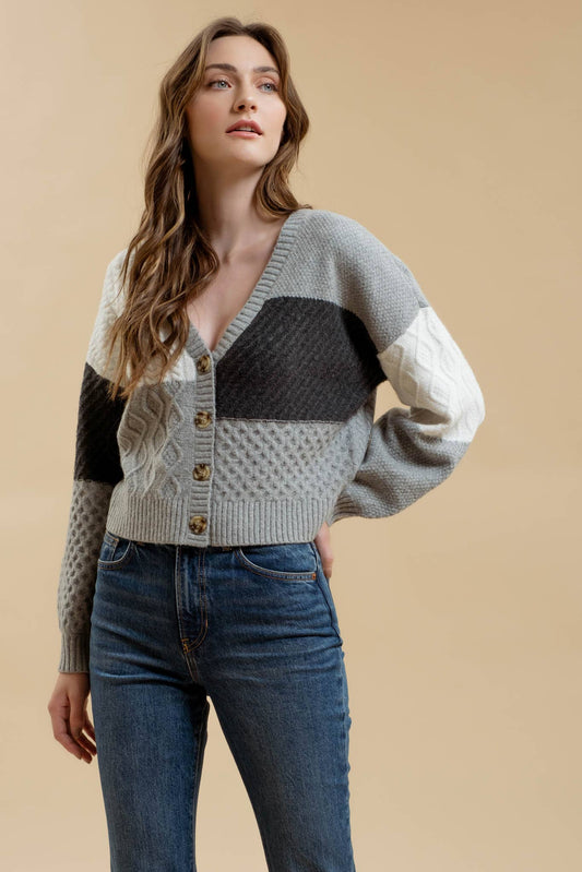 Women’s patchwork cable knit cardigan for layering and warmth