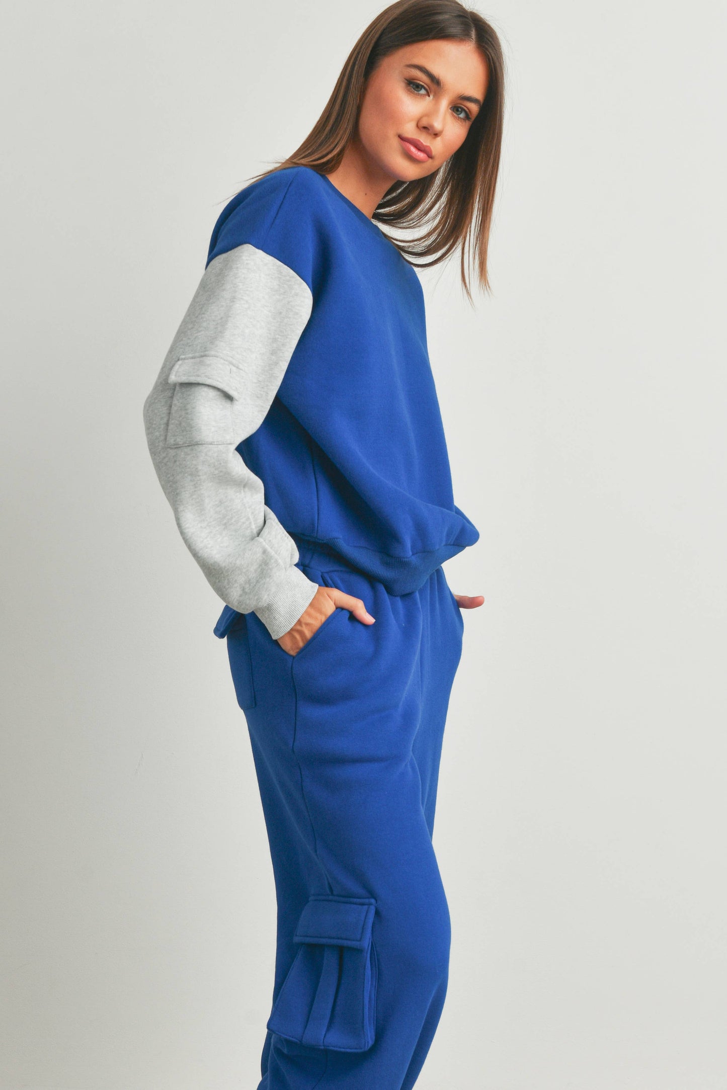 Patched pocket contrast sweatshirt with bold sleeve details