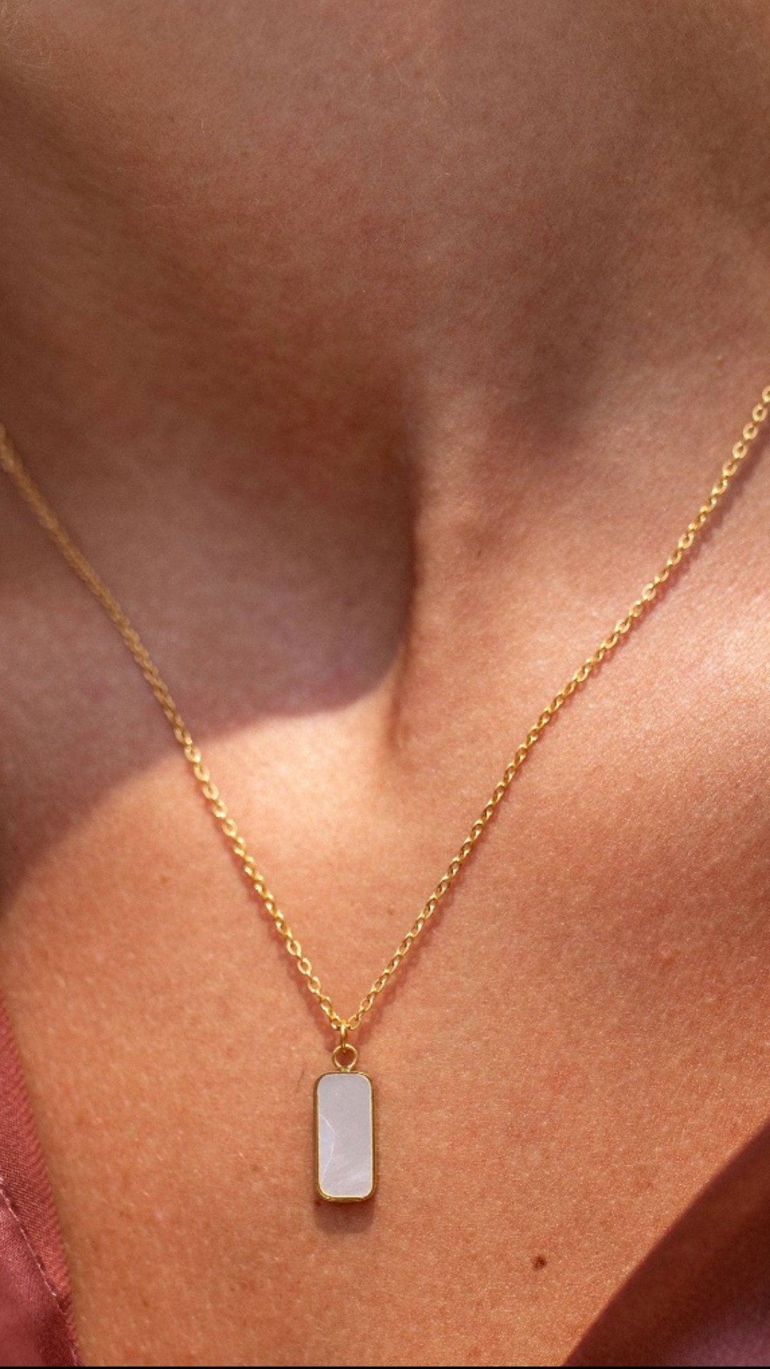 Gold chain necklace with opal pendant