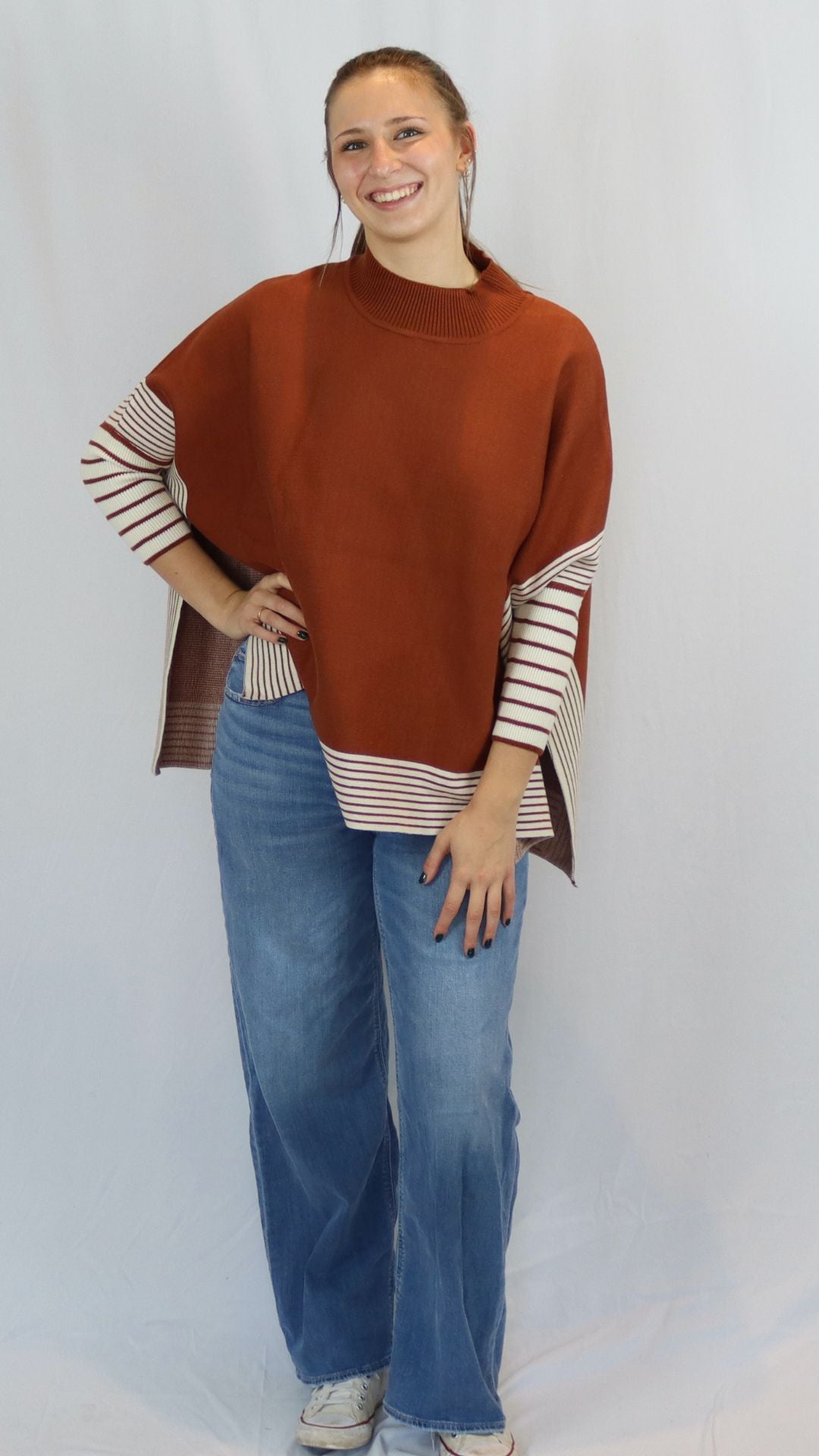rust color cape or poncho